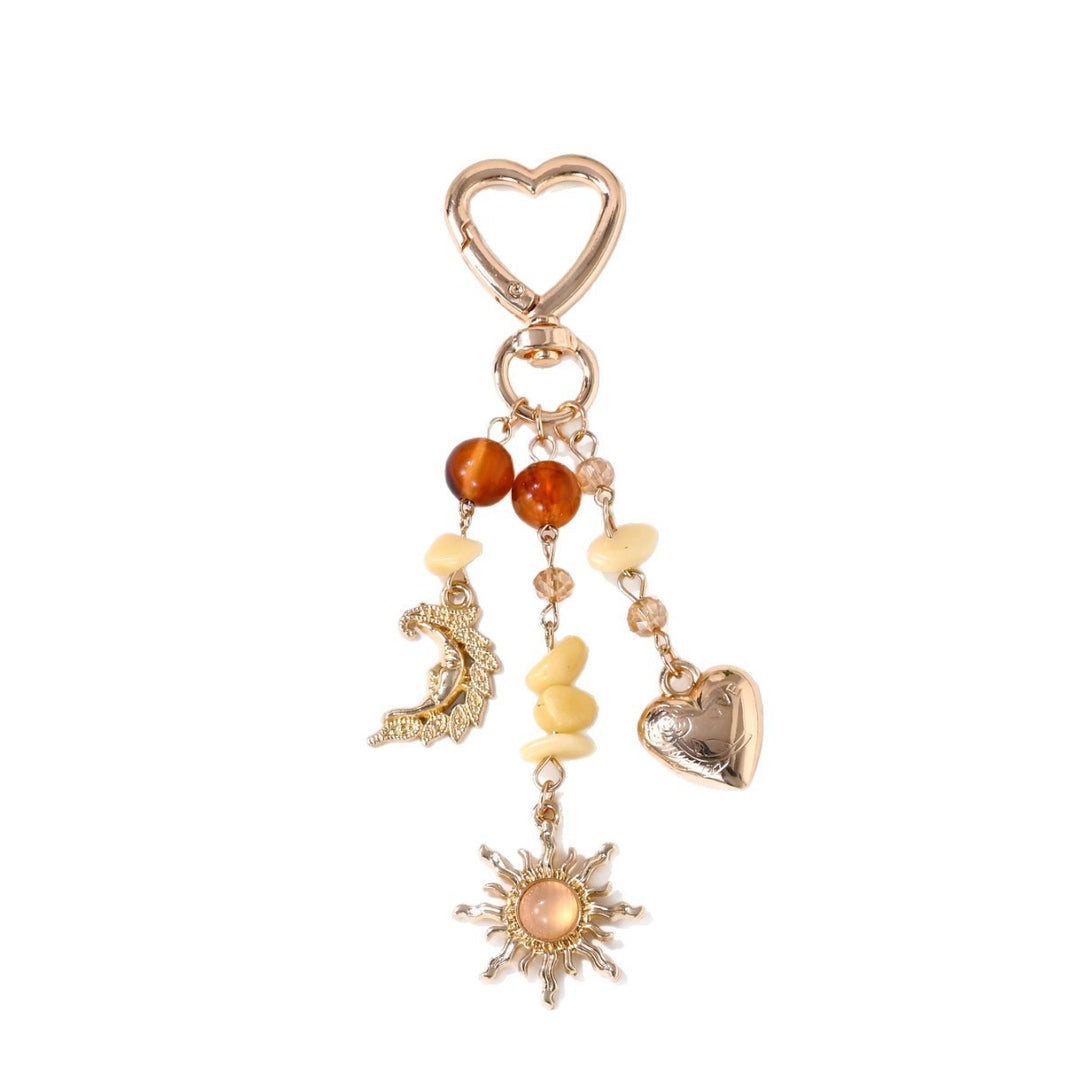 Keychain with Sparkling Sun Motif Bowlift