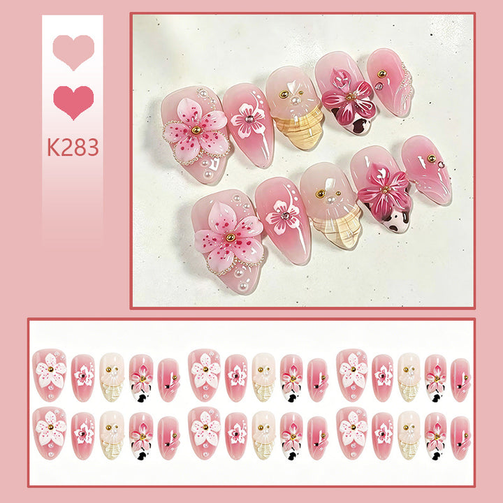 Artificial nail set with elegant floral accents Bowlift