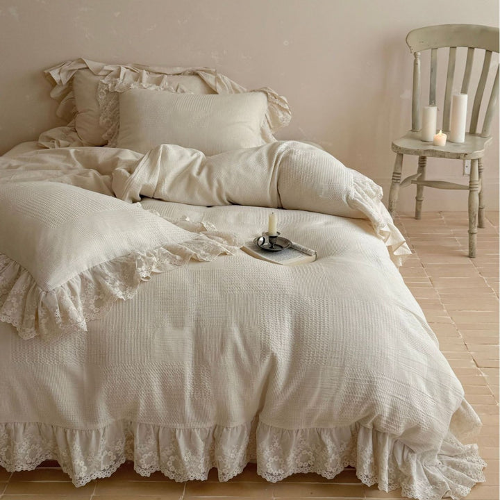 Cotton waffle bedding with floral lace ruffle and wavy hem