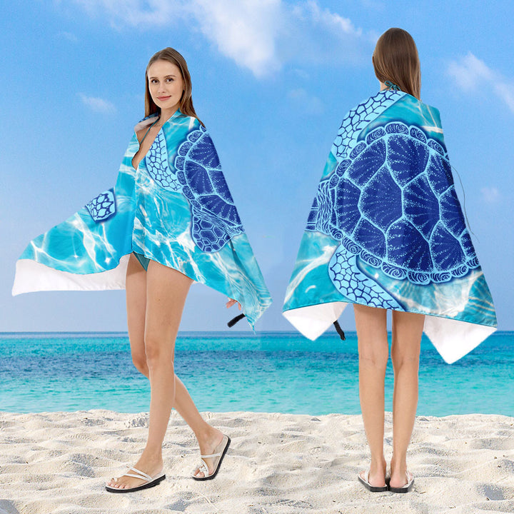 Hooded beach poncho with mandala motif Bowlift