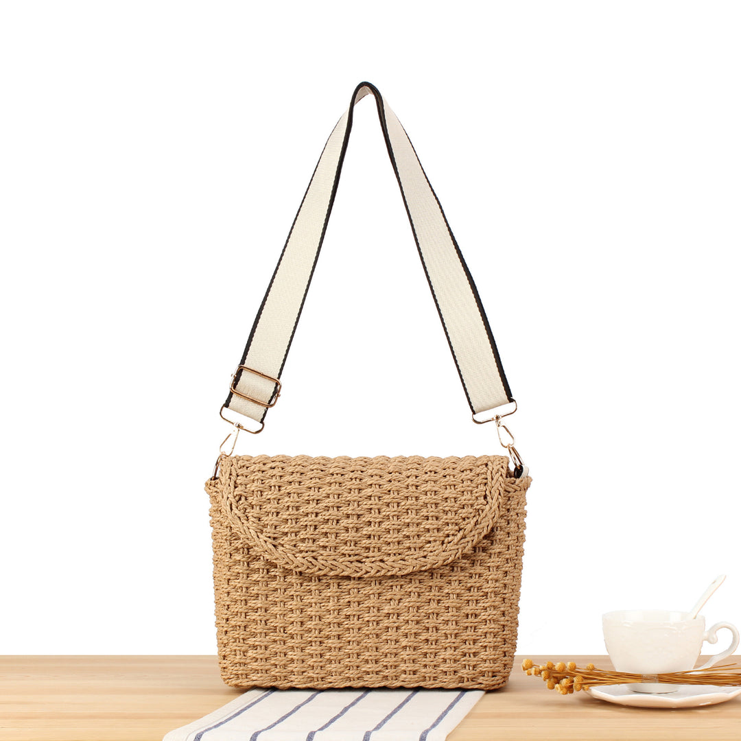 Handbag made of woven natural material with adjustable shoulder strap Bowlift