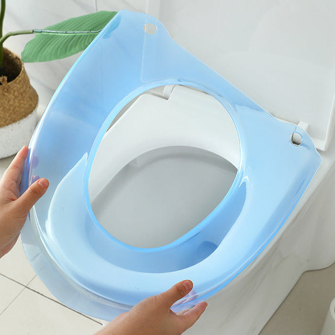 Padded toilet seat reducer with non-slip grips Bowlift