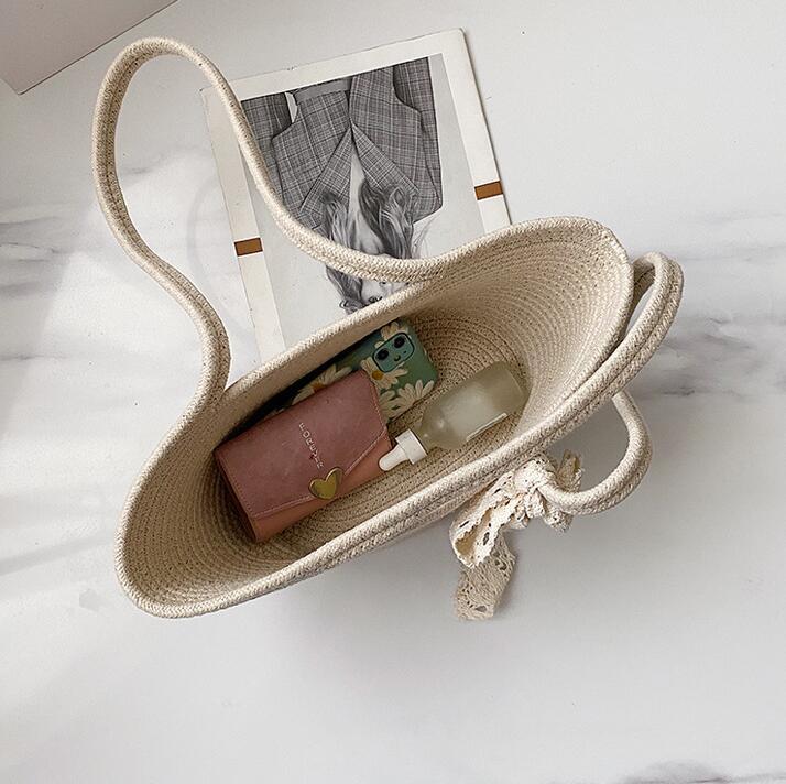 Handcrafted straw bag with lace accent Bowlift