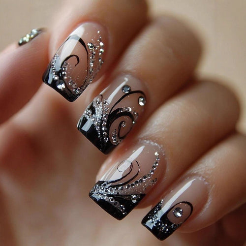 Artificial nails in elegant black-and-white design with glitter applications Bowlift