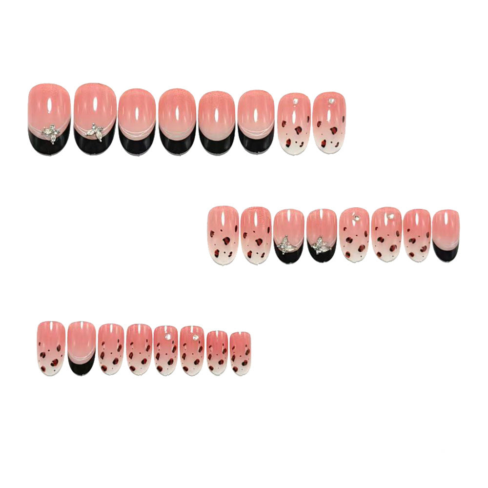Artificial nails in a modern style with elegant embellishments Bowlift