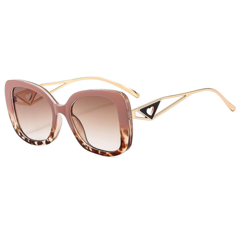 Ladies fashionable oversized sunglasses with luxurious heart detail Bowlift
