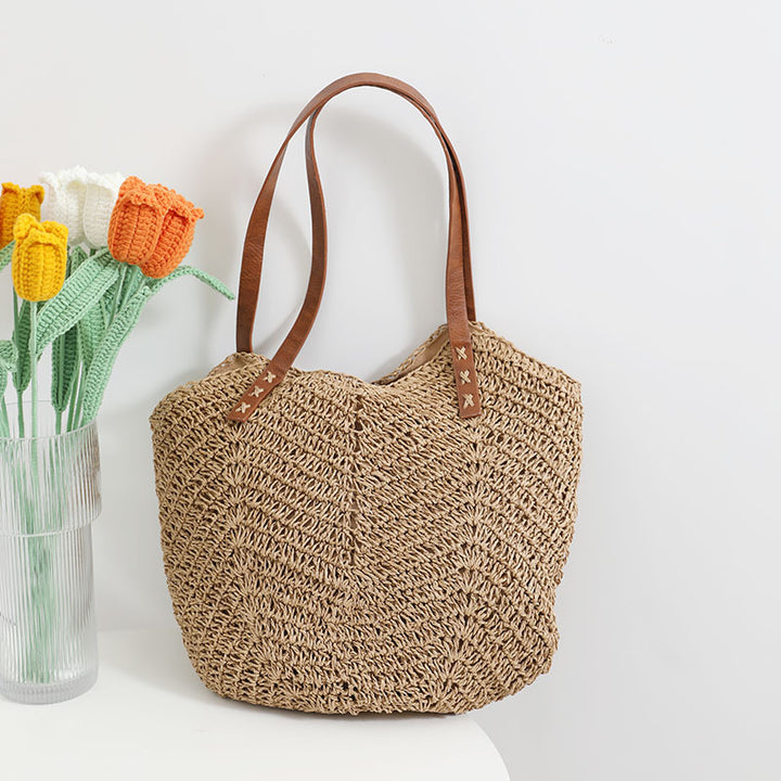Braided basket bag with sturdy leather handles Bowlift