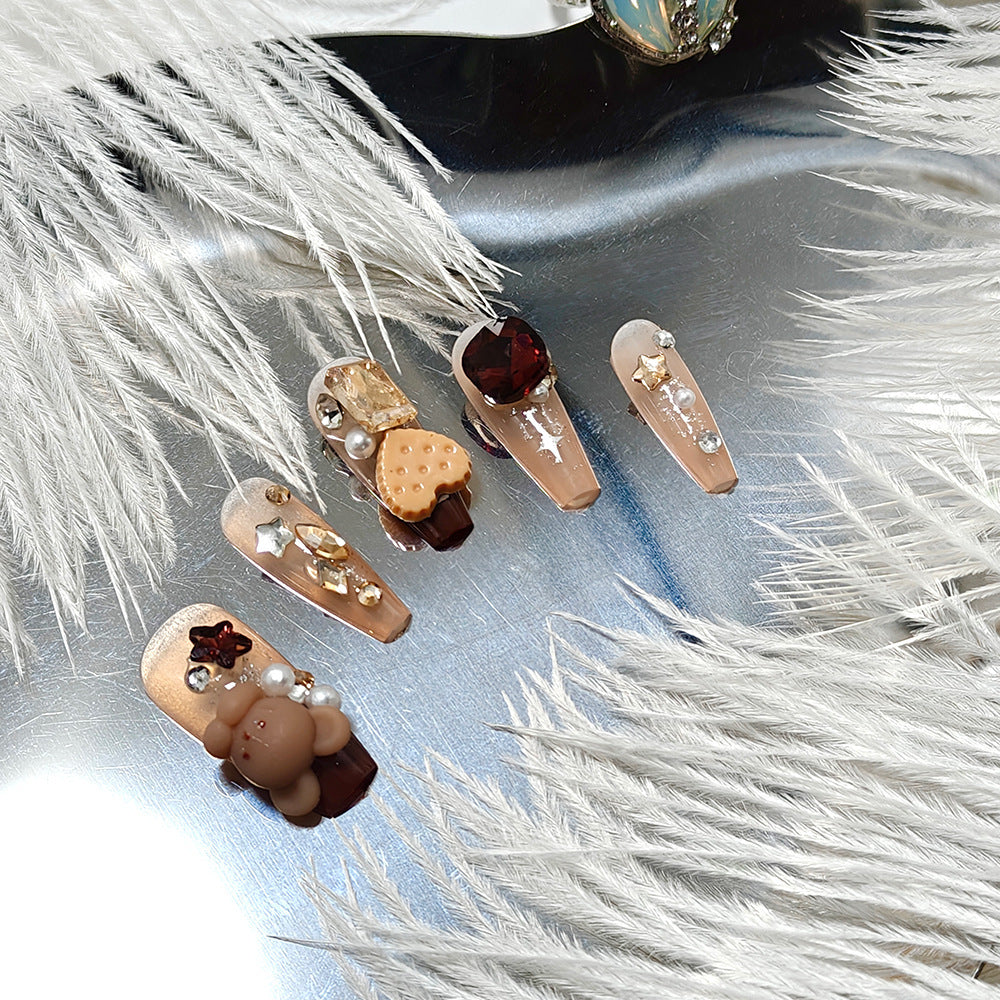 Artificial nails with playful Christmas design Bowlift