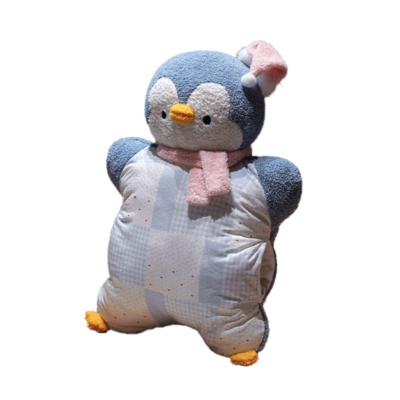 Cozy plush pillow with integrated blanket in penguin look