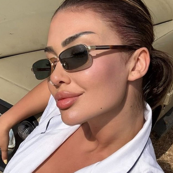 Ladies fashionable sunglasses with stylish metal frame and orange lenses Bowlift