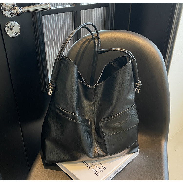 Casual tote bag with practical front pockets Bowlift