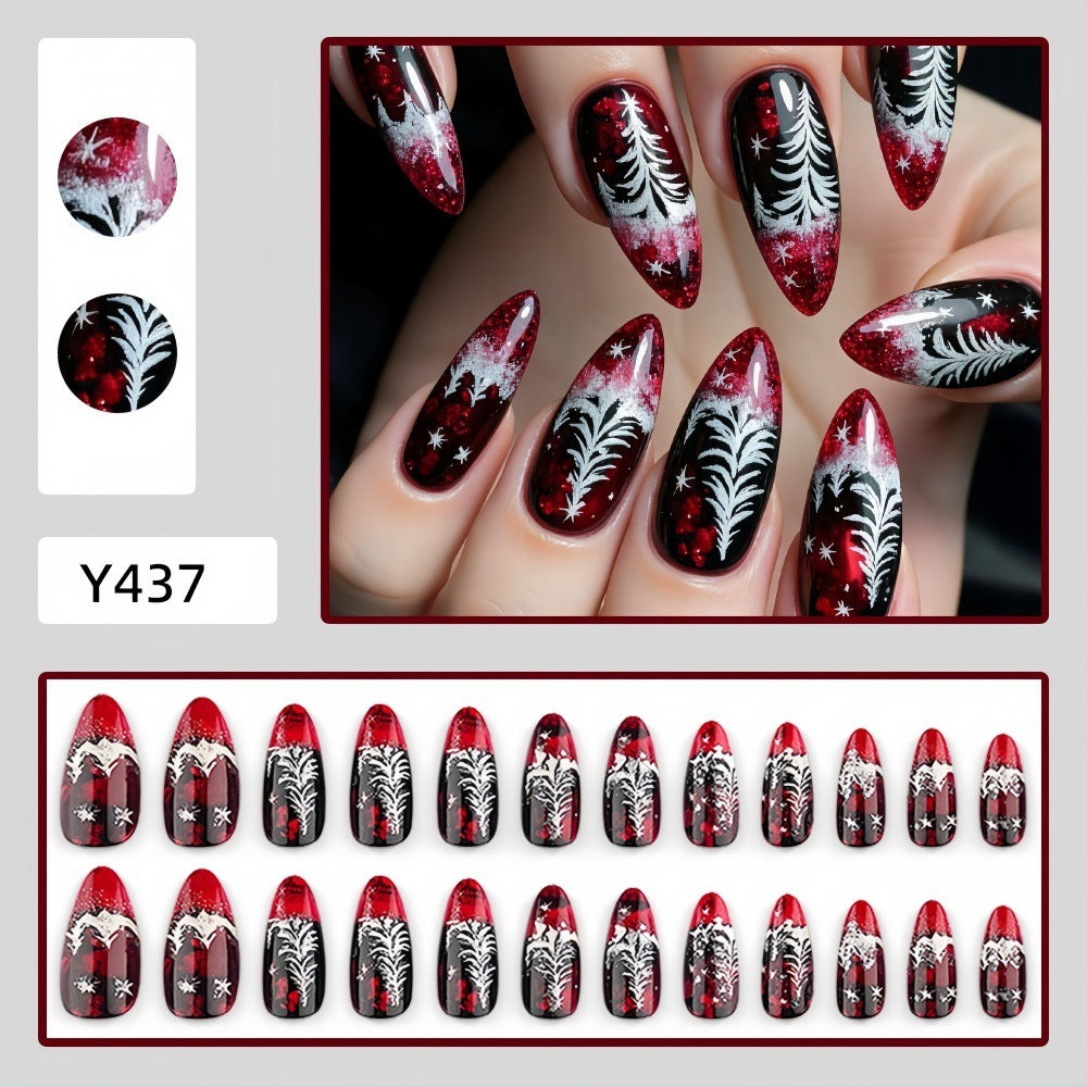 Artificial nails in festive Christmas design with elegant glitter Bowlift