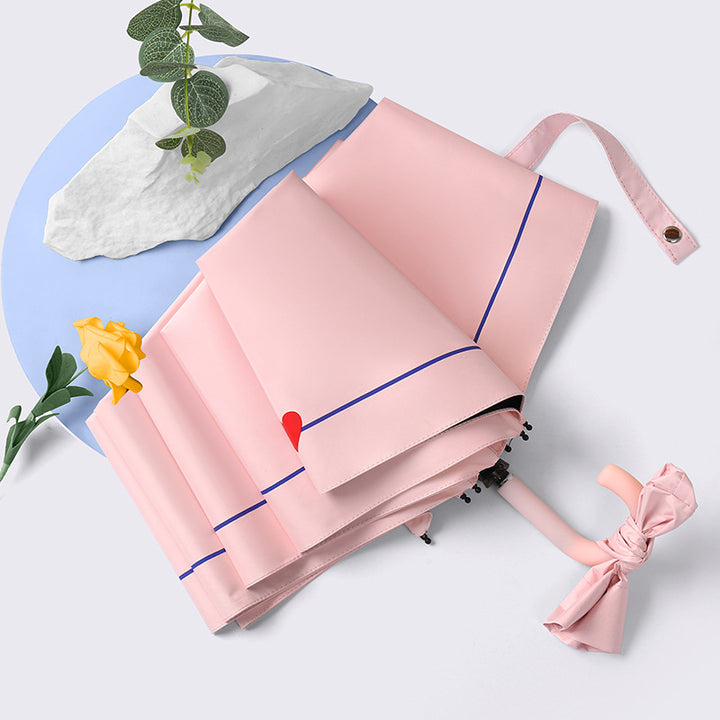 Ladies elegant folding umbrella with ergonomic wooden handle and protective carrying case Bowlift
