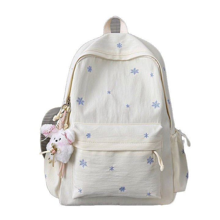 Playful backpack with fine embroidery Bowlift