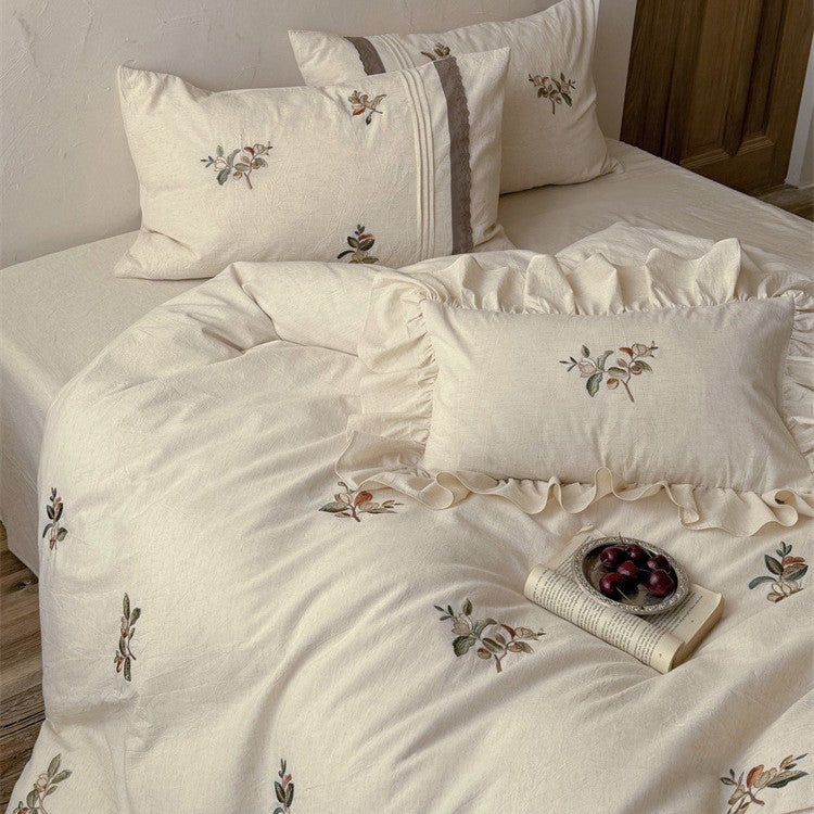 Luxurious embroidered cotton bedding set with ruffled pillow Bowlift