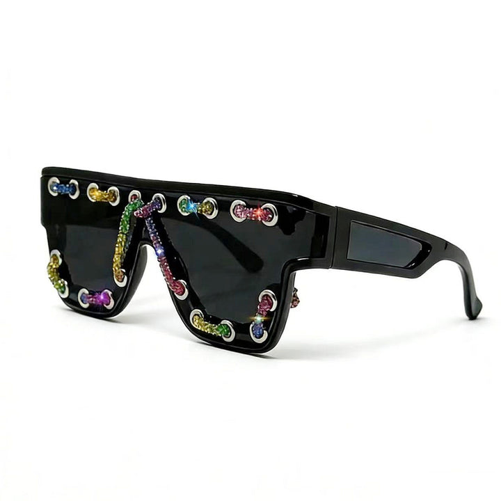Ladies sunglasses with extravagant design and decorative chain embellishment Bowlift
