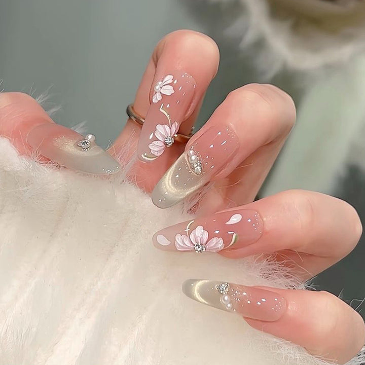 Glamorous artificial nail tips with 3D flower and crystal embellishments Bowlift