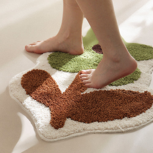 Hand-tufted floral contour rug with high pile and anti-slip