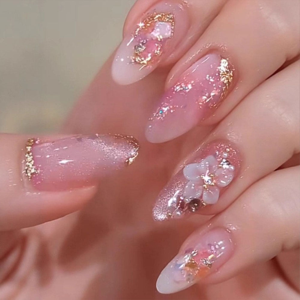 Artificial nails in a playful flower design with glittering accents Bowlift