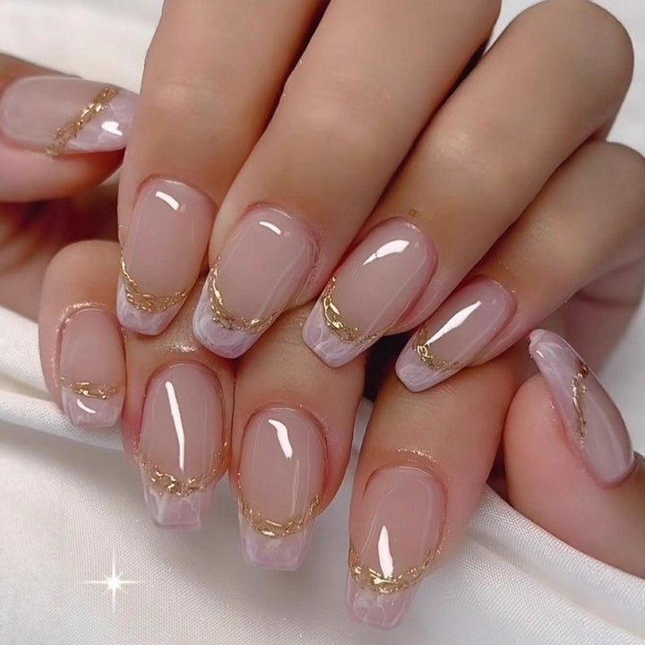 Artificial nails in elegant French tip design Bowlift