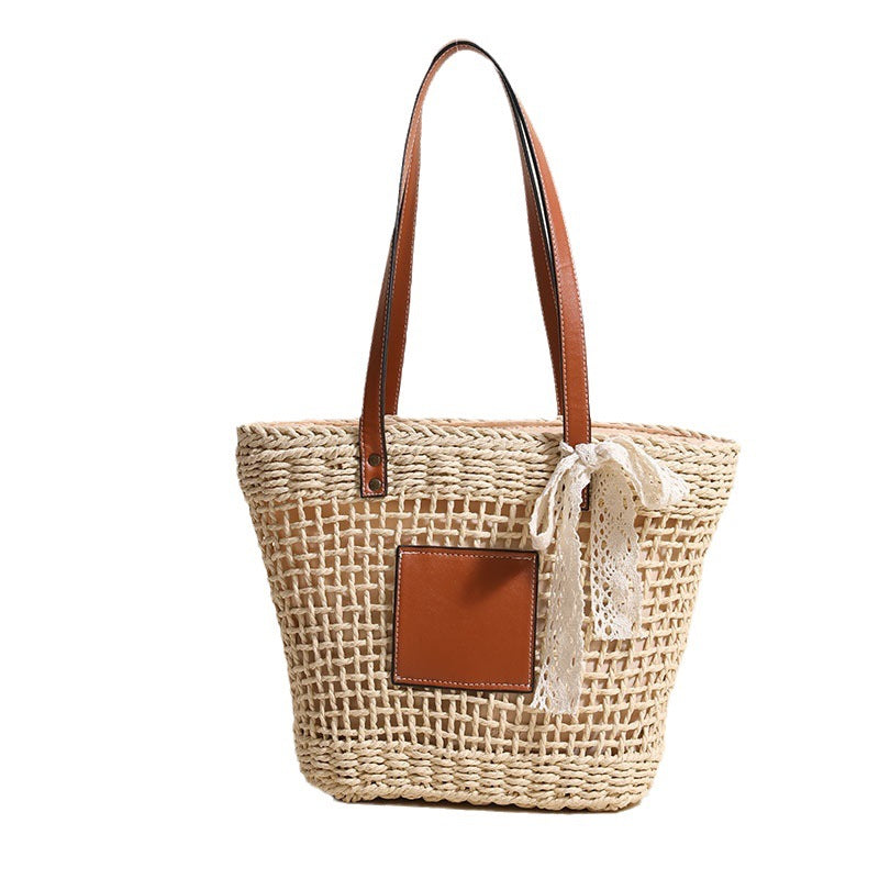 Handmade straw bag with elegant leather accents Bowlift