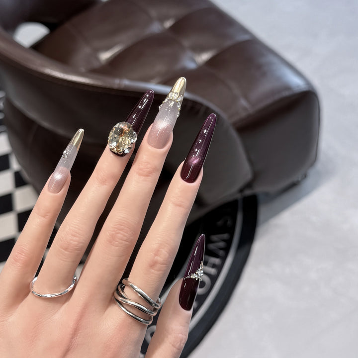 Elegant Stiletto Press-On Nail Set with Decorative Jewel Accents Bowlift