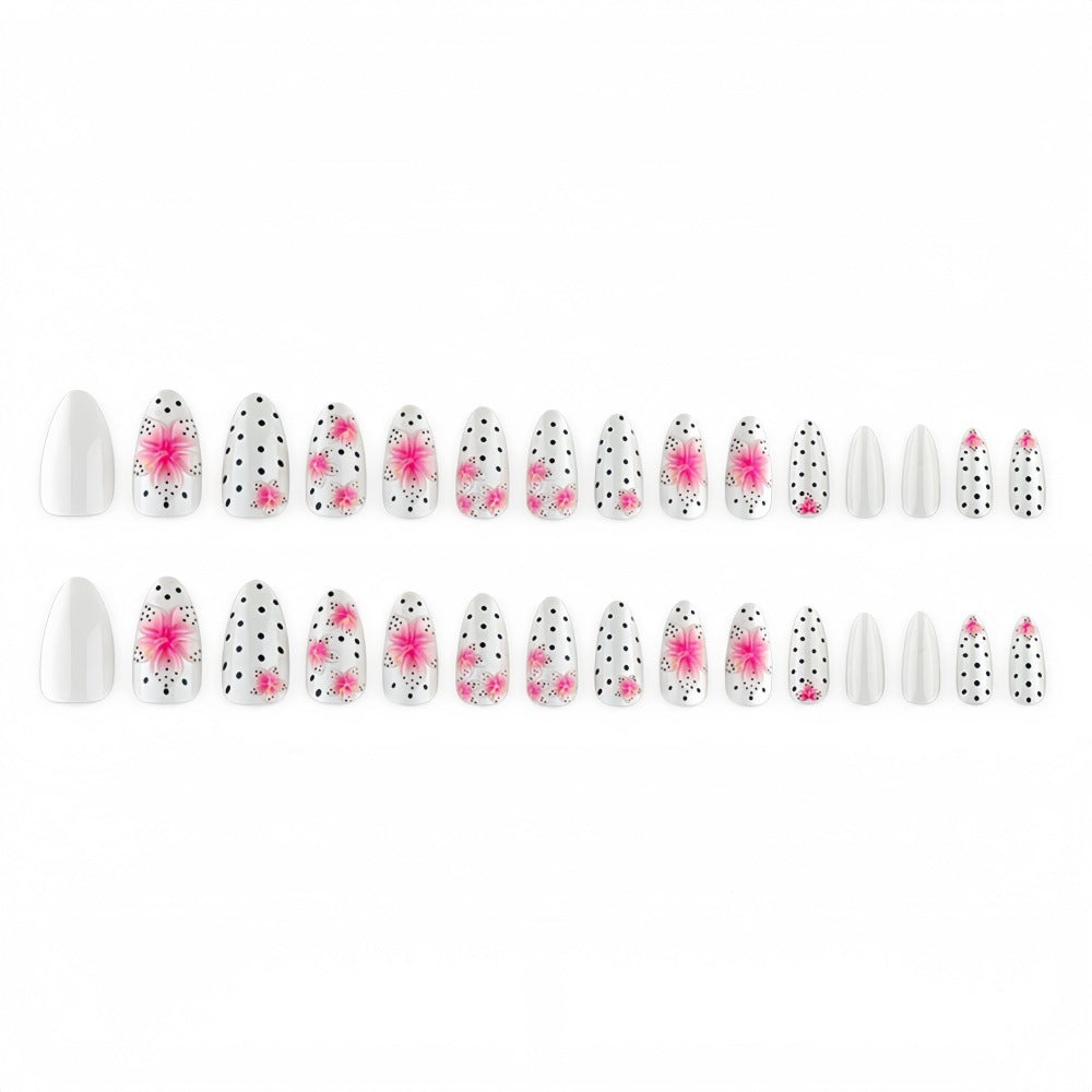 Artificial nail set with floral accents and polka dots Bowlift