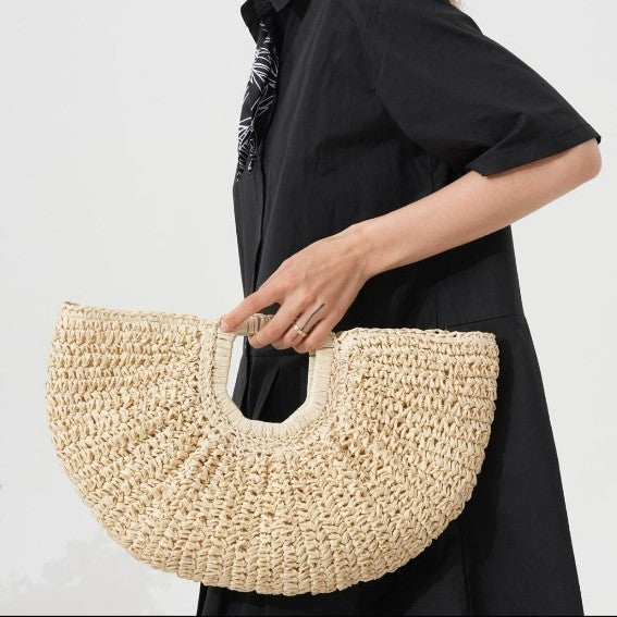 Designer Bast handbag with unique cut Bowlift