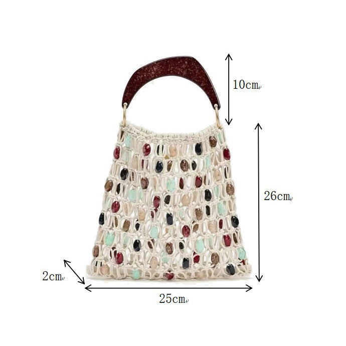 Handcrafted designer shoulder bag with unique stone accents Bowlift