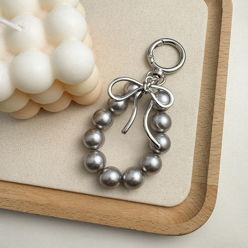 Charming Bow and Bead Keychain Bowlift