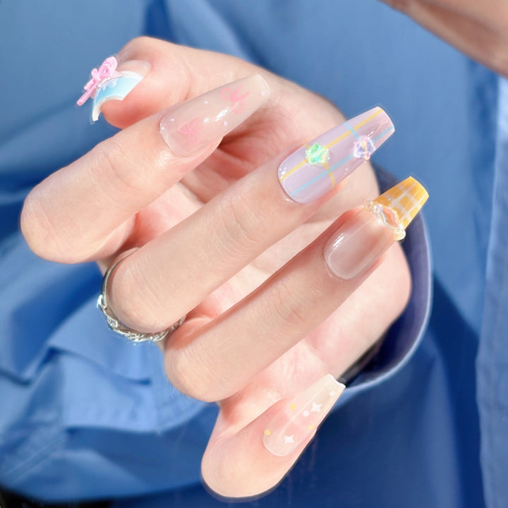 Artistic Press-On Nail Set with Whimsical Designs Bowlift