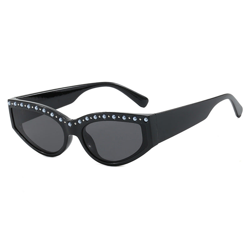 Women's Cat-Eye Sunglasses with Sparkling Rhinestone Accents and Animal Pattern Bowlift