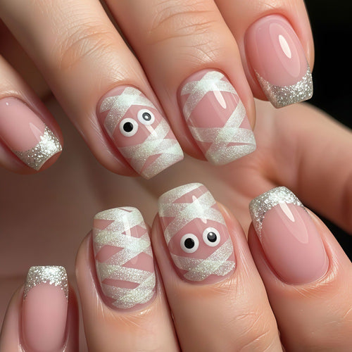 Artificials nails with playful eye design and glitter tips Bowlift