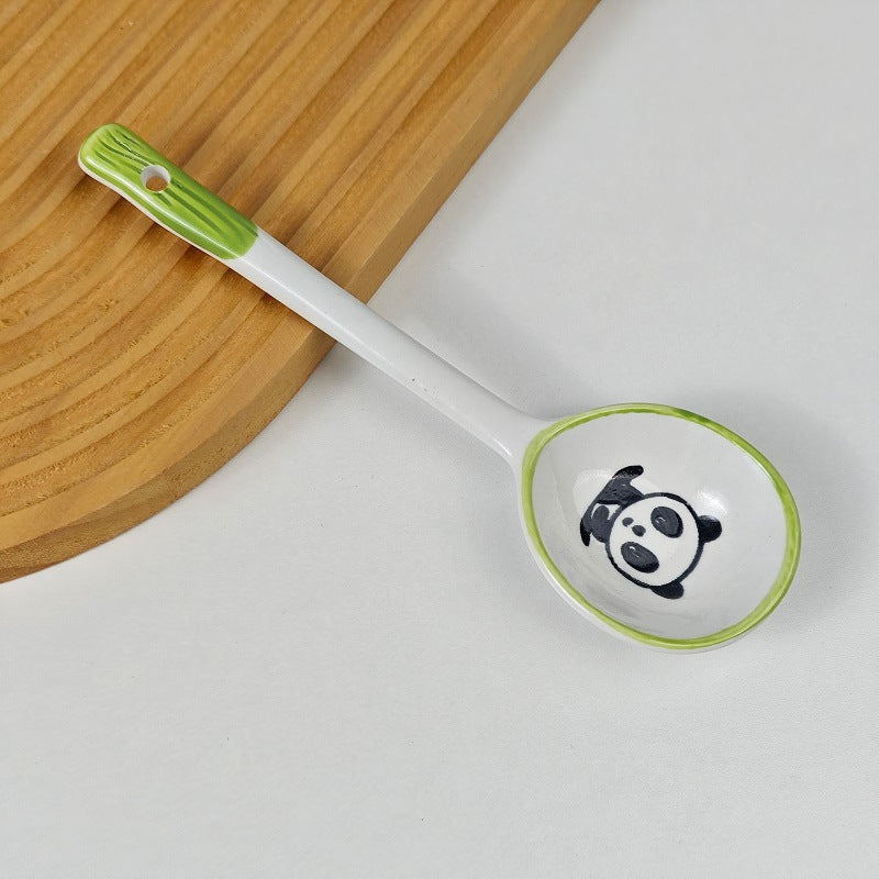 Ceramic soup spoon with lucky cat illustration and ergonomic long-handle Bowlift