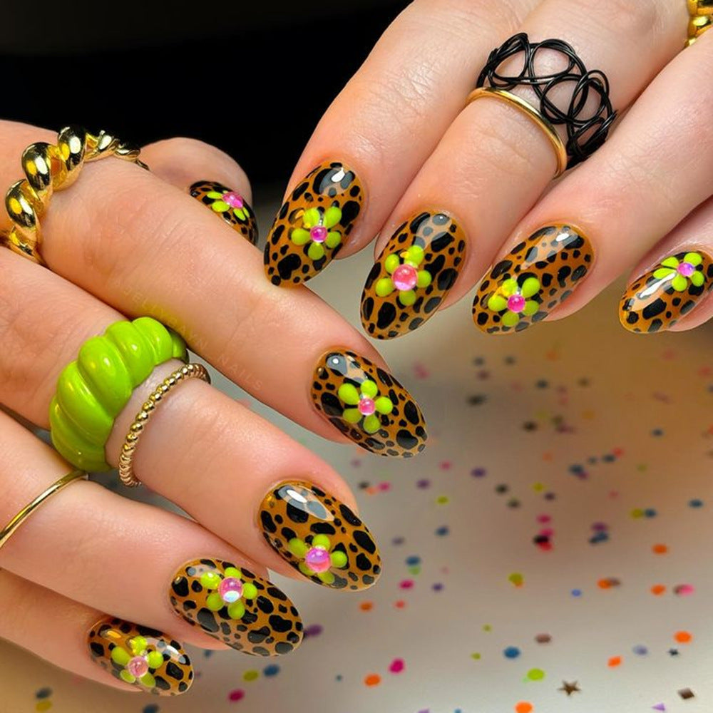 Artificial nails in modern animal patterns with floral accents Bowlift