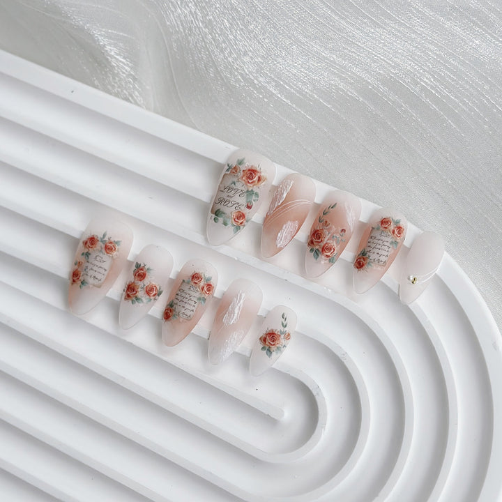 Artistic Press-On Nail Set with Floral and Text Design