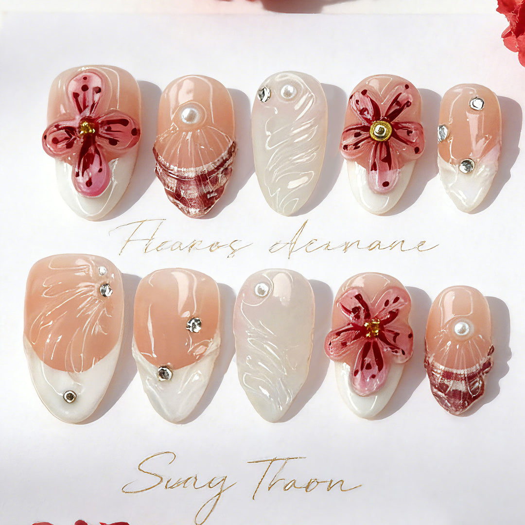 Artificial nails with handcrafted flower and glitter elements Bowlift