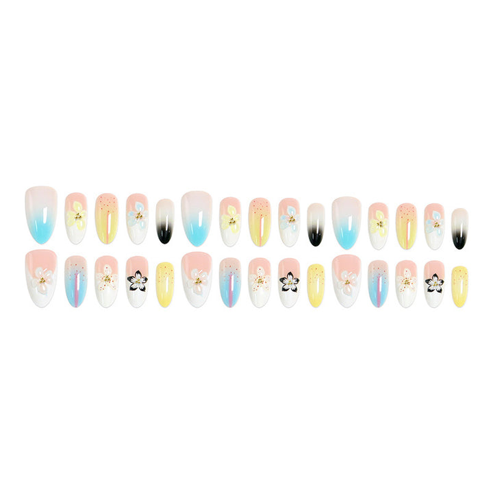 Artificial nail set with floral and glittering decorations Bowlift