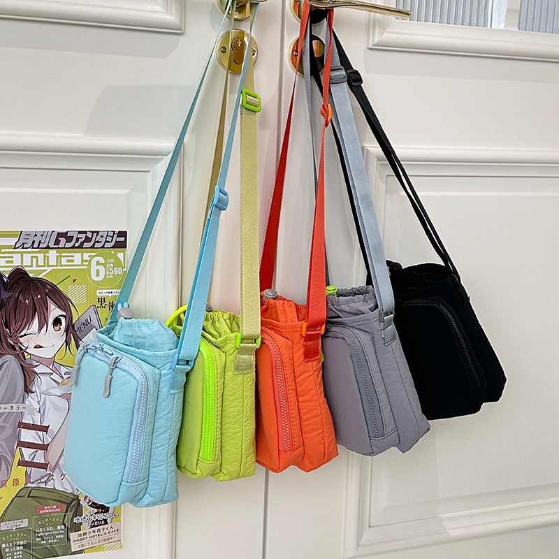 Compact Drawstring Crossbody Utility Pouch with Front Zip Pocket Bowlift
