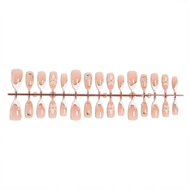 Artificial nail set with elegant floral design and glamorous 3D applications Bowlift