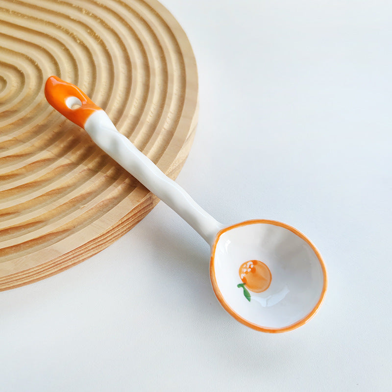 Ceramic soup spoon with lucky cat illustration and ergonomic long-handle Bowlift