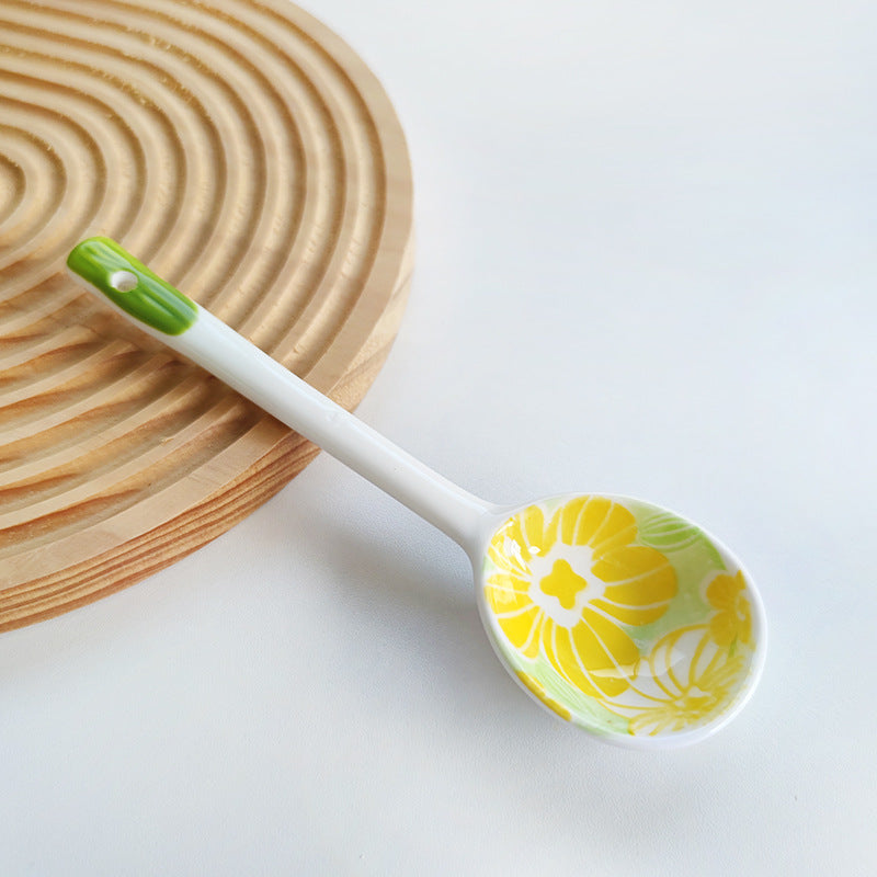 Ceramic soup spoon with lucky cat illustration and ergonomic long-handle Bowlift