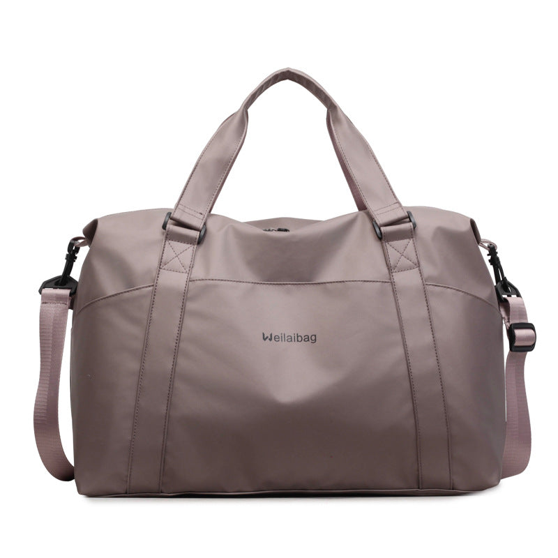 Multifunctional Sports And Travel Bag With Structured Surface Bowlift