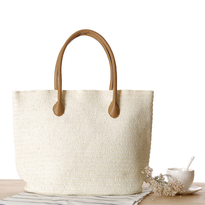 Spacious straw tote bag with elegant leather straps Bowlift