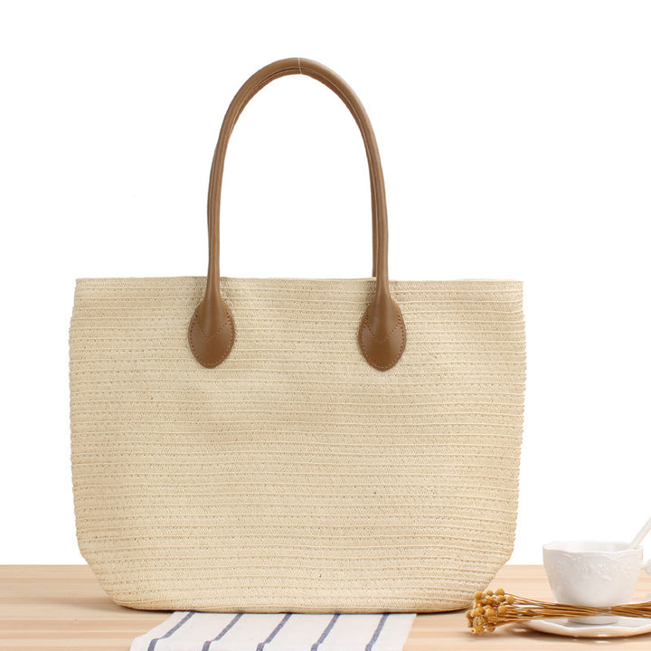 Spacious straw tote bag with elegant leather straps Bowlift