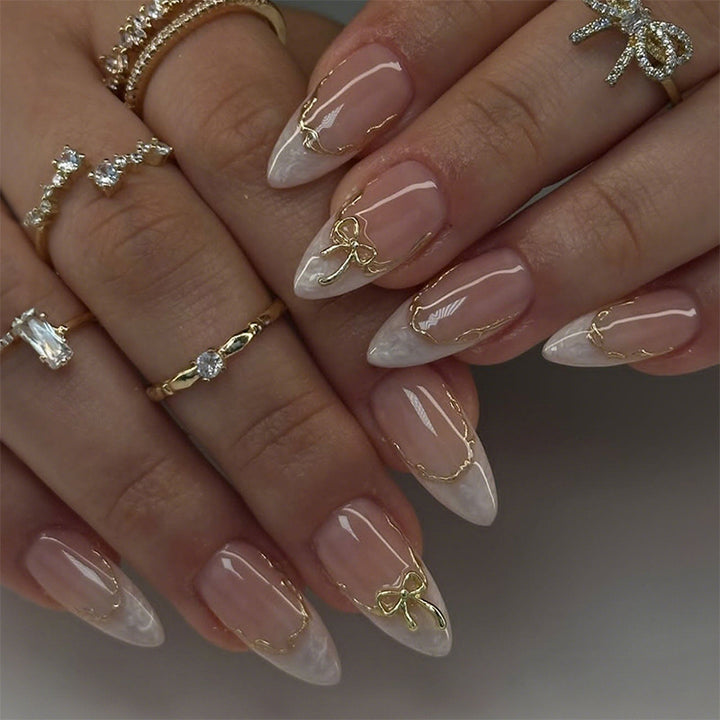 Elegant Press-On Nail Art with Gold Accents Bowlift