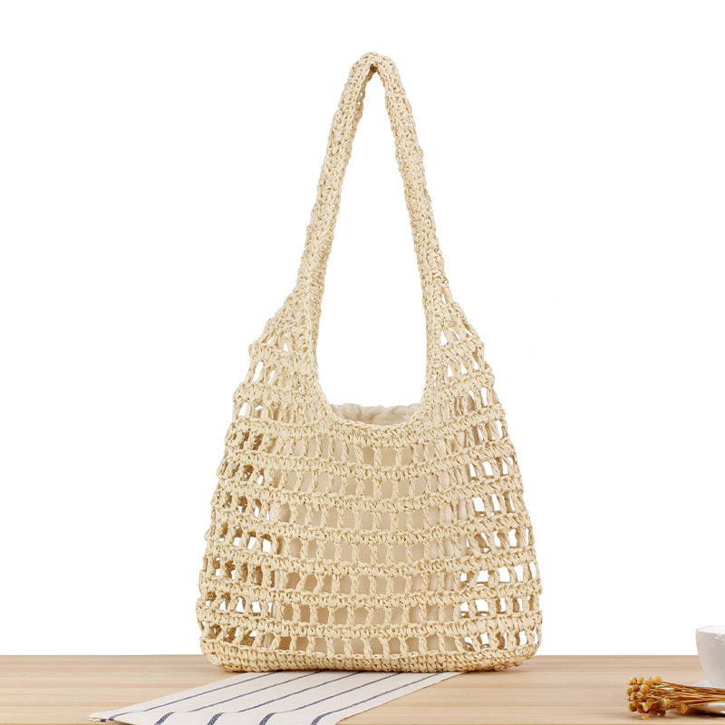 Handcrafted net shoulder bag with sturdy carrying handle Bowlift