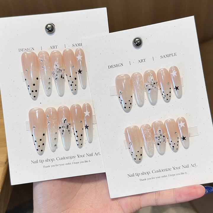 Acrylic Nails Set with Creative Designs and Shimmering Accents Bowlift