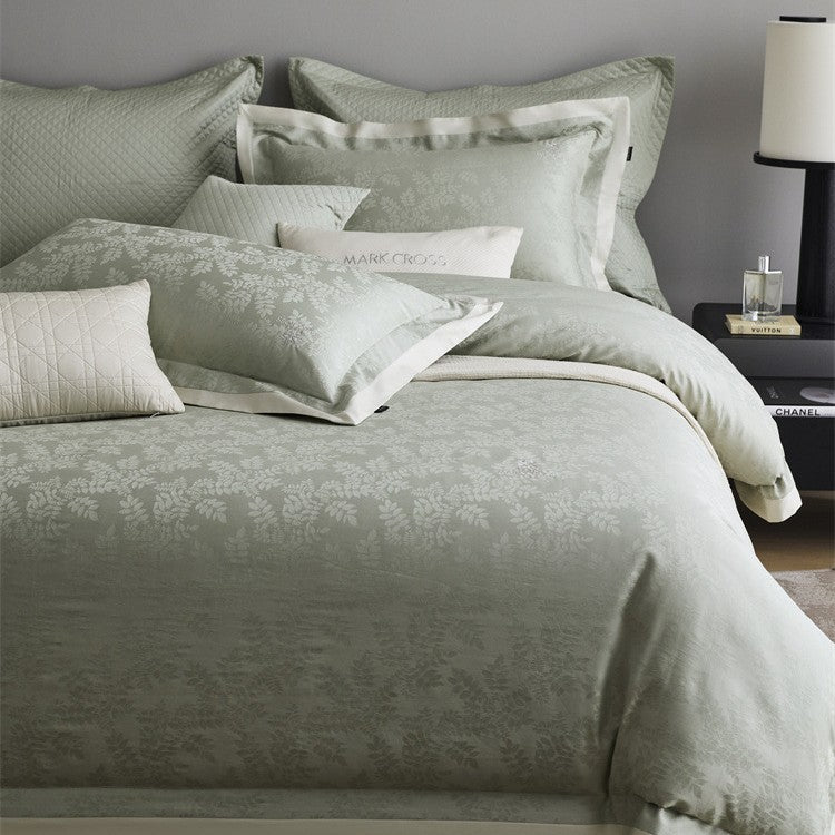 Premium duvet cover set with subtle jacquard structure and decorative ribbon Bowlift