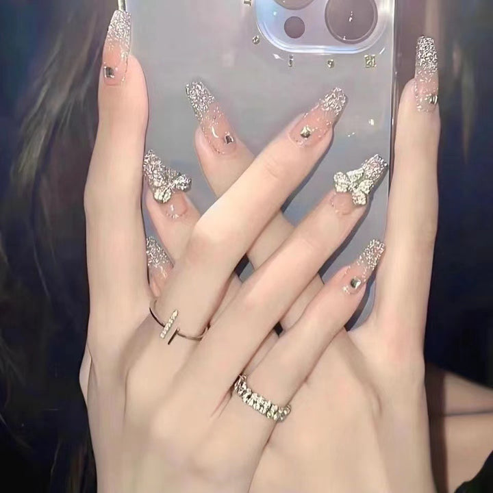 Artificial artificial nails with heart design and glitter elements Bowlift